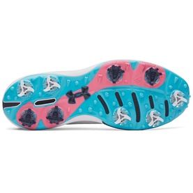 Under Armour men's golf shoe sole view in gray, with pink and teal outsole and metal cleats