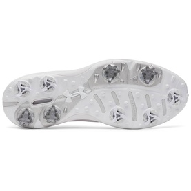 White Under Armour football cleat sole view, showing silver metal studs and embossed UA logo on a white outsole.