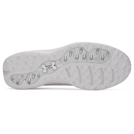 White Under Armour trainer sole view, showing wavy flex grooves, circular traction pods, and embossed logo in grey and white tones.