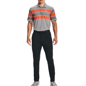 Model wearing Under Armour black slim-fit golf trousers, styled with a grey and orange striped polo shirt