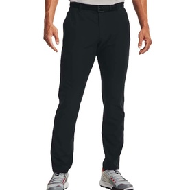 Model wearing Under Armour black slim-fit trousers with a clean front, styled with grey and red trainers