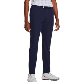 Model wearing Under Armour navy golf trousers, styled with a plaid polo shirt and white golf shoes