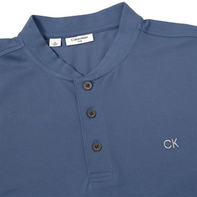Calvin Klein Golf denim blue polo shirt, mandarin collar, three-button placket, embroidered CK logo to chest