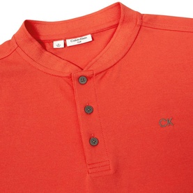 Calvin Klein Golf coral Henley polo shirt, three-button placket detail and embroidered logo at chest