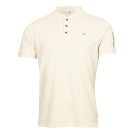 Calvin Klein cream short-sleeve polo shirt with henley neckline, metal snap buttons, and embroidered logo on chest