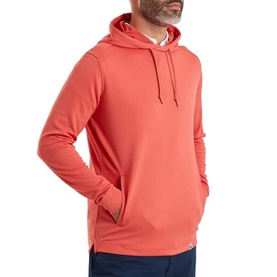 Model wearing Footjoy hoodie in Solid Nantucket Red, lightweight pullover style with kangaroo pocket and drawstring hood