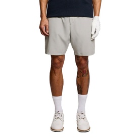 Model wearing light grey casual shorts with elasticated waist, styled with white socks and white trainers