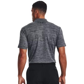Model wearing Under Armour grey polo shirt, back view, showing textured fabric and short sleeves, styled with black trousers