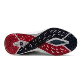 Footjoy golf shoe sole in white, navy and red with patterned traction lugs and branded heel detail.