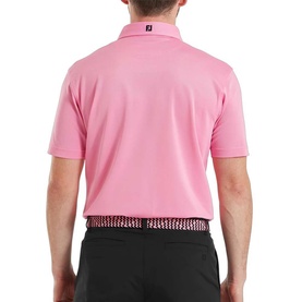 Model wearing FootJoy Pink Pop polo shirt, back view, styled with black trousers and patterned belt