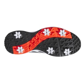 Black and red spiked golf shoe outsole with white accents, showing cleats and flexible traction pattern.