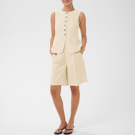 Model wearing Kaffe Feather Gray Melange sleeveless button-front vest and wide-leg shorts co-ord set, styled with black sandals.