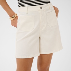 Model wearing Kaffe chalk shorts with patch pockets, styled with a striped top and gold bangle bracelet.