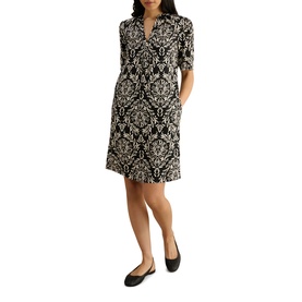 Model wearing Hobbs black and cream damask print shirt dress, elbow-length sleeves, V-neck, knee length, styled with black ballet flats.