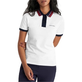 Model wearing Calvin Klein Golf white polo shirt with navy and red tipped collar and cuffs, short sleeves, logo embroidery on chest