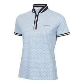 Model wearing Calvin Klein Golf Blue Bell short sleeve polo shirt with dot print, navy zip collar and tipped sleeves