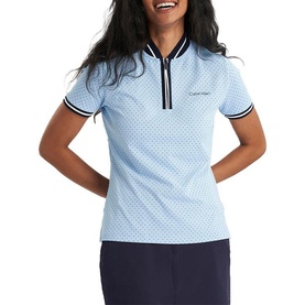 Model wearing Calvin Klein Golf Blue Bell polo shirt with zip neck, contrast tipped collar and cuffs, small dot print pattern