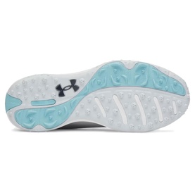 Under Armour women's golf shoe sole in grey, featuring light blue rubber outsole with spike lugs and navy UA logo.