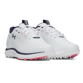 Under Armour women's golf shoes in white with navy trim, pink spike outsole, spiked grip sole and logo detail
