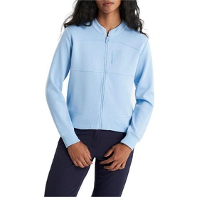 Model wearing Calvin Klein Golf Blue Bell zip-through fleece jacket with ribbed collar, styled with navy trousers