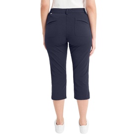 Model wearing Calvin Klein Golf navy cropped trousers, rear view, slim fit with back pockets and elasticated waistband.