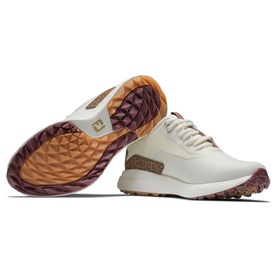 FootJoy women's golf shoes in cream beige multi, featuring spikeless sole, tan cork detail panel, and purple-toned outsole with diamond tread.
