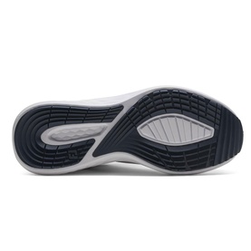 Footjoy women's golf shoe sole in white and navy blue, showing textured rubber outsole with traction grooves and grey flex zones.