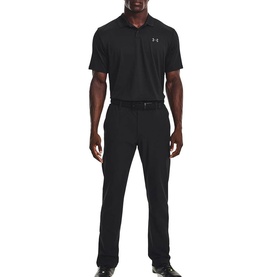 Model wearing Under Armour black polo shirt with matching black trousers and belt, styled with black shoes.