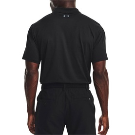Model wearing Under Armour black short-sleeve polo shirt, back view, paired with black shorts