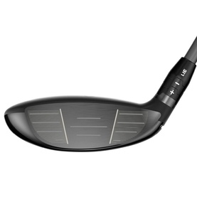 Black golf driver club head with textured face, loft adjustment markings and dark graphite shaft, shown at angle
