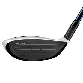 Close-up of a golf driver head in black and silver with blue shaft, showing textured face and Twist Face technology inscription