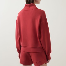 Model wearing Varley Davidson Half-Zip Sweatshirt in bossa nova, back view, styled with matching shorts