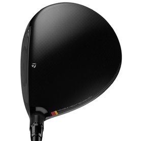 TaylorMade golf driver with matte black club head, red and gold accent stripe on hosel, and black graphite shaft