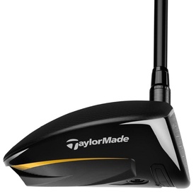 TaylorMade golf driver with black clubhead, gold accent detailing, and black shaft, shown from face-on angle