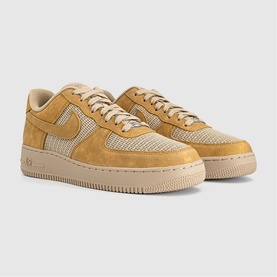Nike Air Force 1 trainers in Twine/Linen colourway, featuring suede and woven textile panels with a cream midsole, angled pair view.