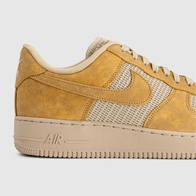 Nike Air Force 1 trainer in Twine and Linen, featuring suede upper with mesh panelling and cream midsole, close-up side detail