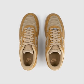 Nike men's trainers in twine and linen colourway, overhead flat lay showing mesh and suede upper with tonal laces and rubber sole.