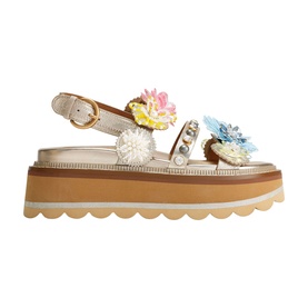 Kurt Geiger London gold platform sandal with floral embellishments, pearl trim, ankle strap, and scalloped flatform sole