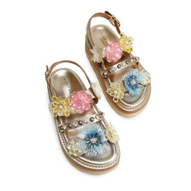 Kurt Geiger London gold sandals with multicolour floral appliqu&eacute;, stud trim, ankle strap, and flatform sole