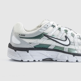 Nike P-6000 trainer in white and dark teal, featuring mesh upper, tonal laces, chunky white sole and silver Swoosh logo