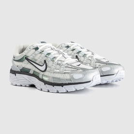 Nike P-6000 trainers in white and silver metallic with dark green and black accents, chunky white sole, lace-up style