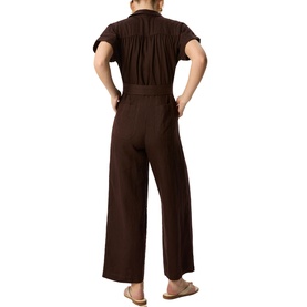 Model wearing Whistles brown short-sleeve wide-leg jumpsuit, shown from behind with ruched bodice detail and relaxed fit trousers.