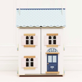 Le Toy Van Daisylane wooden dolls house, white with blue patterned roof, navy front door and arched windows