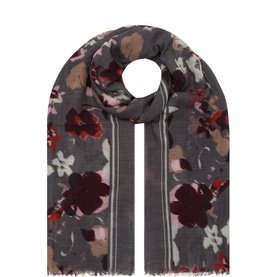Masai scarf in magnet grey with red and burgundy floral print, frayed hem, and stripe border detail. 100% wool.