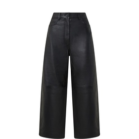 Masai black leather wide-leg cropped trousers with high waist, seam detailing, and clean hem finish.