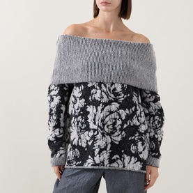 Model wearing Sarah Pacini black floral jacquard off-shoulder knit sweater with grey ribbed bardot neckline, oversized fit