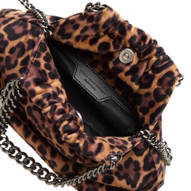 Stella McCartney crossbody bag in leopard print, open top view showing black interior lining and silver chain straps