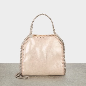 Stella McCartney Falabella Mini Crossbody Bag in shell pink with silver-tone curb-chain trim, top handles, and detachable chain shoulder strap.