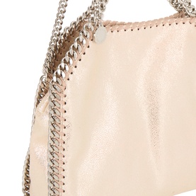Stella McCartney Falabella Mini Crossbody Bag in shell pink with silver-tone curb-chain trim, close-up detail shot
