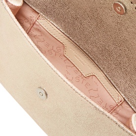Stella McCartney crossbody bag interior in Shell Pink, showing branded lining and magnetic clasp detail in rose gold tone.